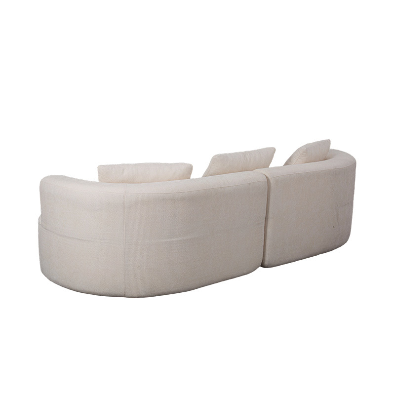 Canapé double modulable en velours crème avec coussins assortis et dossier incurvé Canapé double modulable en velours crème avec coussins assortis et dossier incurvé