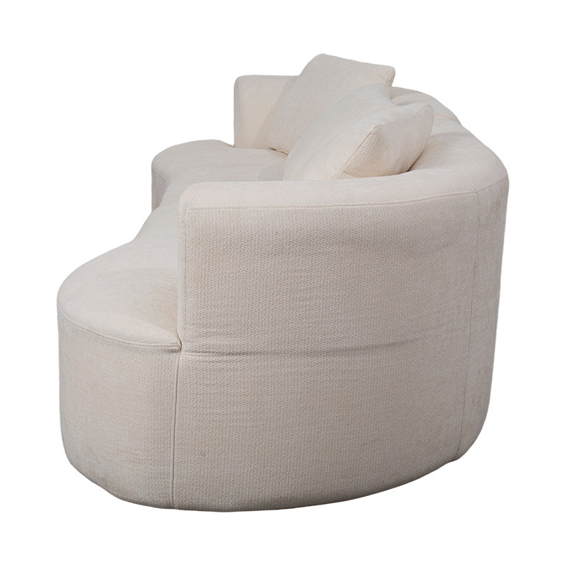 Canapé double modulable en velours crème avec coussins assortis et dossier incurvé Canapé double modulable en velours crème avec coussins assortis et dossier incurvé