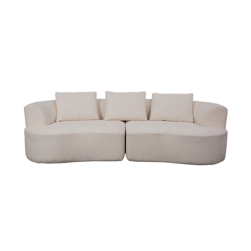 Canapé double modulable en velours crème avec coussins assortis et dossier incurvé Canapé double modulable en velours crème avec coussins assortis et dossier incurvé